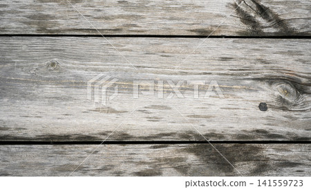 Weathered wood texture background. Aged rustic wooden planks with natural grain and knots. Vintage grey timber board surface for design. Copy space for text Weathered wood texture background. Aged rustic wooden planks with natural grain and knots. Vintage grey timber board surface for design. Copy space for text 141559723
