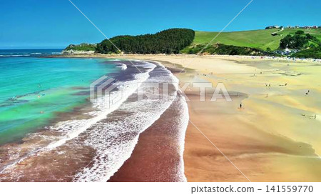 Experience a Stunning Beach View with Crystal Clear Waters and Beautiful Golden Sands 141559770