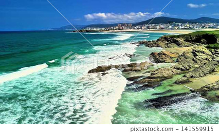 Experience the Stunning Coastal View Featuring Turquoise Waters and Soft Sandy Shores Experience the Stunning Coastal View Featuring Turquoise Waters and Soft Sandy Shores 141559915