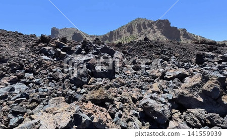 Lava Rock Landscape Featuring Clear Blue Sky in a Stunning Natural Setting of Nature 141559939