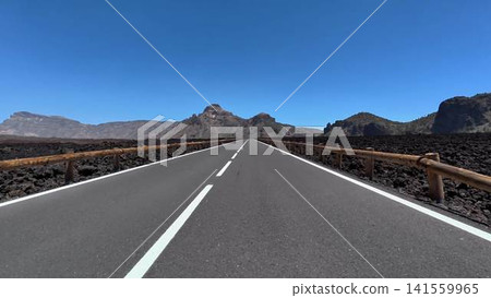 The scenic highway offers stunning views of a volcanic landscape throughout the journey The scenic highway offers stunning views of a volcanic landscape throughout the journey 141559965