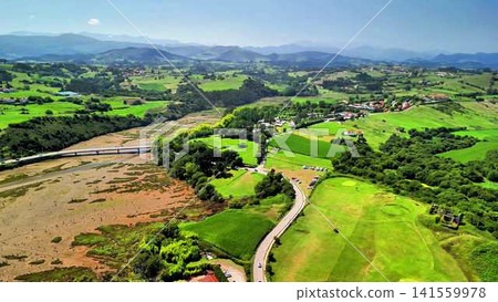 Stunning Scenic Aerial Views of Vibrant Green Landscapes and Pristine Beaches await you Stunning Scenic Aerial Views of Vibrant Green Landscapes and Pristine Beaches await you 141559978