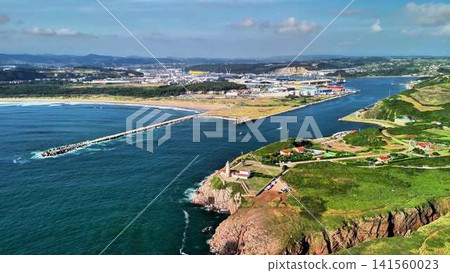 Breathtaking Aerial View of a Beautiful Coastal Landscape and Vibrant Harbor Scene Breathtaking Aerial View of a Beautiful Coastal Landscape and Vibrant Harbor Scene 141560023