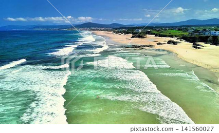 Captivating Aerial View of a Serene Beach with Crystal Clear Turquoise Waters Beneath Captivating Aerial View of a Serene Beach with Crystal Clear Turquoise Waters Beneath 141560027