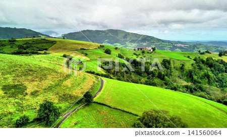 Lush Green Hills and Scenic Landscapes Ideal for Relaxation and Outdoor Exploration Lush Green Hills and Scenic Landscapes Ideal for Relaxation and Outdoor Exploration 141560064