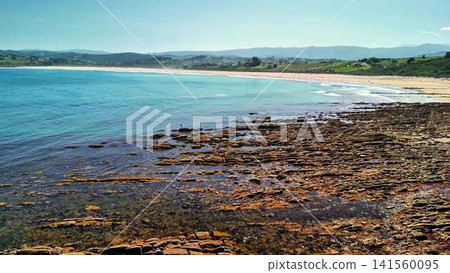 Enjoy the amazing Scenic Coastal View featuring a stunning Rocky Shoreline and Tranquil Waters Enjoy the amazing Scenic Coastal View featuring a stunning Rocky Shoreline and Tranquil Waters 141560095