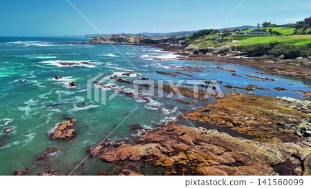 Stunning and Beautiful Coastal Landscape Showcasing Clear Waters and a Rocky Shoreline Stunning and Beautiful Coastal Landscape Showcasing Clear Waters and a Rocky Shoreline 141560099