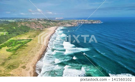 Stunning Aerial View of the Serene Beach and the Ocean Waves, Capturing Natures Beauty Stunning Aerial View of the Serene Beach and the Ocean Waves, Capturing Natures Beauty 141560102