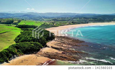 Stunning Aerial View of a Coastal Area Featuring a Sandy Beach and Pristine Clear Water Stunning Aerial View of a Coastal Area Featuring a Sandy Beach and Pristine Clear Water 141560103