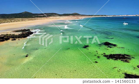 Experience the Stunning and Breathtaking Aerial View of a Tropical Beach with Crystal Clear Waters Experience the Stunning and Breathtaking Aerial View of a Tropical Beach with Crystal Clear Waters 141560133
