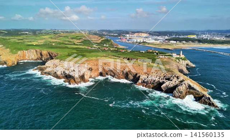Stunning Aerial View of a Beautiful Coastal Landscape Featuring Waves and Majestic Cliffs Stunning Aerial View of a Beautiful Coastal Landscape Featuring Waves and Majestic Cliffs 141560135