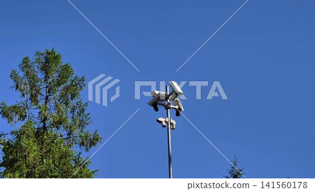 Surveillance Cameras Positioned on Tower for an Impressive and Comprehensive Sky View Surveillance Cameras Positioned on Tower for an Impressive and Comprehensive Sky View 141560178