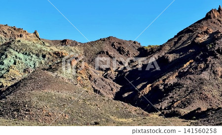 A breathtaking and stunning mountain landscape featuring vibrant and colorful rock formations A breathtaking and stunning mountain landscape featuring vibrant and colorful rock formations 141560258