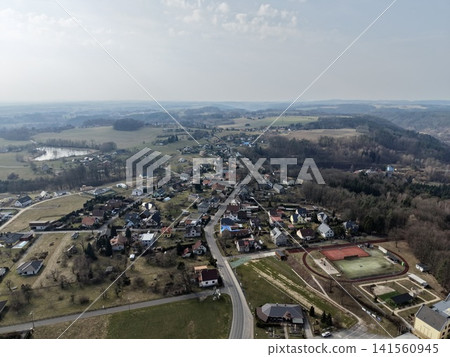 Sports area ambiance. Athletic complex nestled within houses with lush surroundings and preparations Sports area ambiance. Athletic complex nestled within houses with lush surroundings and preparations 141560945