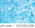 Ice, blue water, waves, summer background 141561296