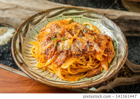 Pasta with slow-cooked meat ragu Pasta with slow-cooked meat ragu 141561447