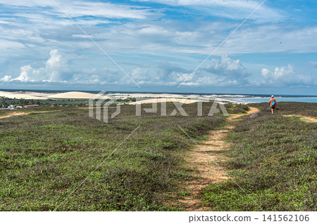 Jericoacoara, Brazil - Jan 25, 2026: Trail along the coast and beaches from Jericoacoara to Pedra Furada, Ceara, Brazil. Jericoacoara, Brazil - Jan 25, 2026: Trail along the coast and beaches from Jericoacoara to Pedra Furada, Ceara, Brazil. 141562106
