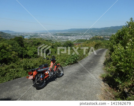 A view of the plains from a touring motorcycle. A view of the plains from a touring motorcycle. 141562679