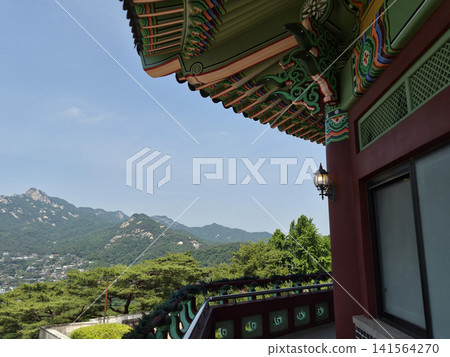 It is a landscape featuring a roof with *dancheong* (traditional decorative coloring). 141564270