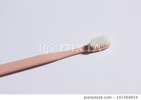It is a colorful toothbrush. It is a colorful toothbrush. 141564654