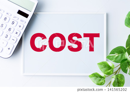 Whiteboard with the word "COST" Whiteboard with the word "COST" 141565202