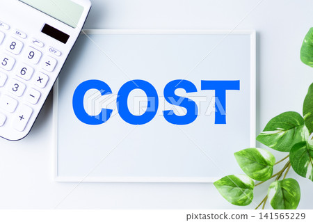 Whiteboard with the word "COST" Whiteboard with the word "COST" 141565229