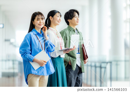 Male and female business people Male and female business people 141566103