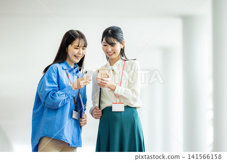 Business woman talking in the office Business woman talking in the office 141566158