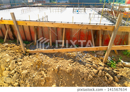 Wooden house foundation work: Slab foundation Wooden house foundation work: Slab foundation 141567634