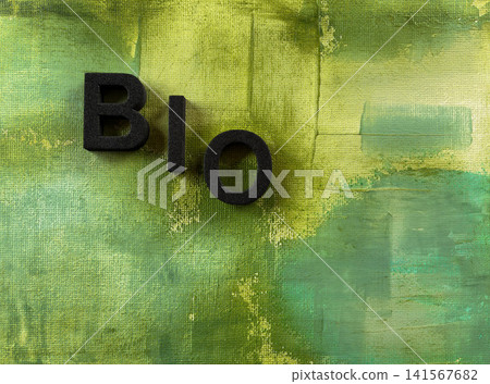 Black letters forming word BIO arranged on green acrylic canvas background, representing organic products, natural living, eco branding, sustainable lifestyle, healthy food, environmental awareness. Black letters forming word BIO arranged on green acrylic canvas background, representing organic products, natural living, eco branding, sustainable lifestyle, healthy food, environmental awareness. 141567682