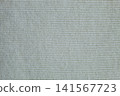 Close Up of Off-White Ribbed Knitted Fabric 141567723