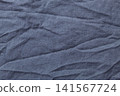 Creased Dark Blue Cotton Fabric Texture 141567724