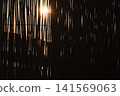 Sunlight shining through vertical bamboo slats, 141569063