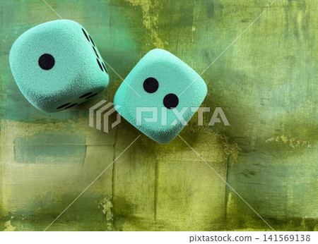Two Foam Dice Showing One and Two on Green Abstract Background - symbolizing luck, chance, probability, random choice, risk, decision making, games, strategy, and playful uncertainty. Two Foam Dice Showing One and Two on Green Abstract Background - symbolizing luck, chance, probability, random choice, risk, decision making, games, strategy, and playful uncertainty. 141569138