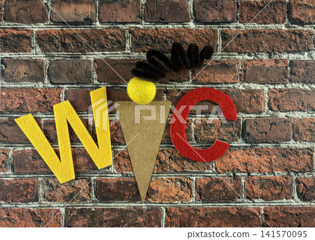 Colorful WC Symbol with Handmade Fabric Letters and Brick Texture - suitable for bathroom, lavatory, public restroom, sanitation, wayfinding, handmade craft, and interior signage concepts. Colorful WC Symbol with Handmade Fabric Letters and Brick Texture - suitable for bathroom, lavatory, public restroom, sanitation, wayfinding, handmade craft, and interior signage concepts. 141570095