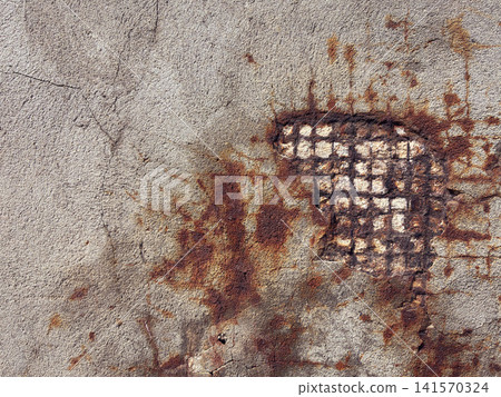 Weathered Concrete Wall with Rust Stains and Exposed Reinforcement - for construction damage, structural deterioration, building inspection, corrosion, renovation, repair, infrastructure concepts. Weathered Concrete Wall with Rust Stains and Exposed Reinforcement - for construction damage, structural deterioration, building inspection, corrosion, renovation, repair, infrastructure concepts. 141570324