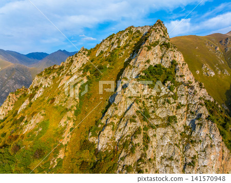 Aerial View of Rugged Mountain Landscape in Kyrgyzstan Aerial View of Rugged Mountain Landscape in Kyrgyzstan 141570948