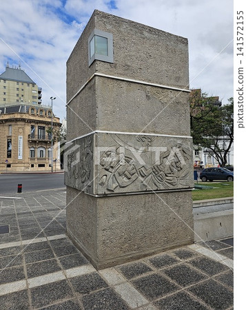 Cordoba, Argentina - April 11, 2026: Relief-Covered Concrete Tower at Plaza Espana Cordoba, Argentina - April 11, 2026: Relief-Covered Concrete Tower at Plaza Espana 141572155