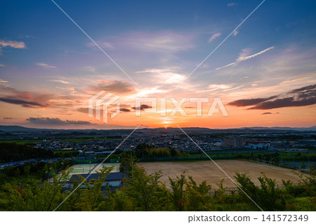 Shiroyamadai Castle Ruins, Kizugawa City, Kyoto Prefecture. Ultra-wide-angle lens. Sunset sinking behind the Ikoma mountain range, painting the sky golden. (11) 141572349