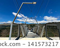 Arouca 516 suspension bridge crossing a dramatic valley in Portugal, showcasing modern engineering, adventure tourism, geometric design, scenic landscapes, and outdoor exploration 141573217