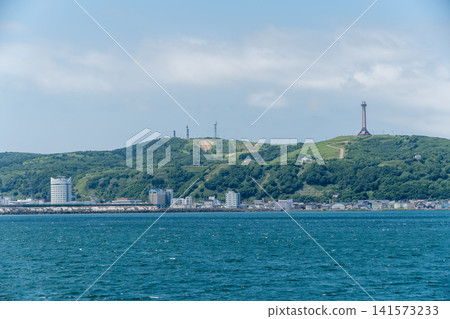 The cityscape of Wakkanai and the 100th anniversary monument as seen from the sea. The cityscape of Wakkanai and the 100th anniversary monument as seen from the sea. 141573233