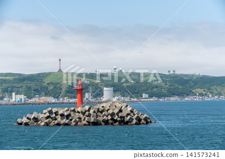 The cityscape of Wakkanai and the 100th anniversary monument as seen from the sea. The cityscape of Wakkanai and the 100th anniversary monument as seen from the sea. 141573241