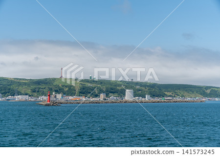 The cityscape of Wakkanai and the 100th anniversary monument as seen from the sea. The cityscape of Wakkanai and the 100th anniversary monument as seen from the sea. 141573245