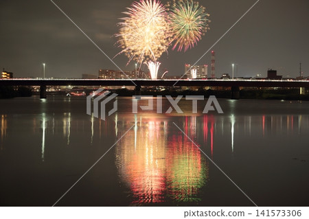 The Kano River Fireworks Festival reflected on the surface of the Kano River The Kano River Fireworks Festival reflected on the surface of the Kano River 141573306