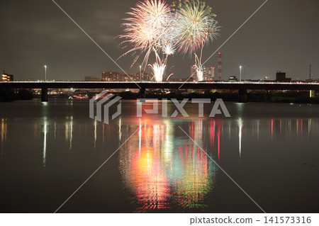 The Kano River Fireworks Festival reflected on the surface of the Kano River The Kano River Fireworks Festival reflected on the surface of the Kano River 141573316