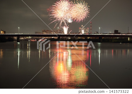The Kano River Fireworks Festival reflected on the surface of the Kano River The Kano River Fireworks Festival reflected on the surface of the Kano River 141573322