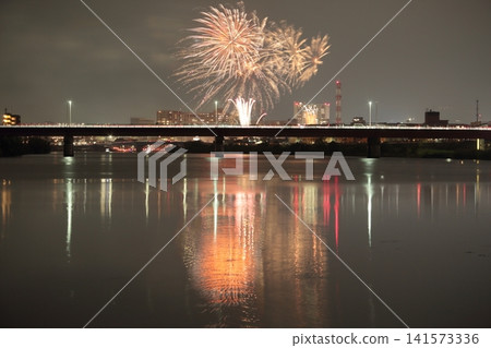 The Kano River Fireworks Festival reflected on the surface of the Kano River The Kano River Fireworks Festival reflected on the surface of the Kano River 141573336