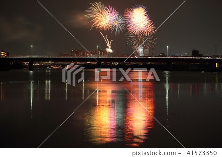 The Kano River Fireworks Festival reflected on the surface of the Kano River The Kano River Fireworks Festival reflected on the surface of the Kano River 141573350