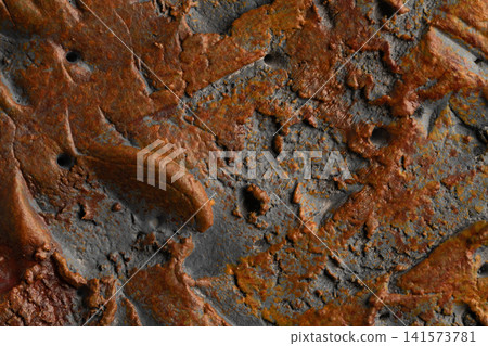 A heavy concrete background accented with reddish-brown rust. A heavy concrete background accented with reddish-brown rust. 141573781