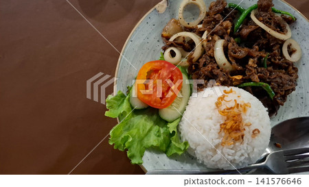 Indonesian Stir Fried Beef Black Pepper with White Rice Indonesian Stir Fried Beef Black Pepper with White Rice 141576646